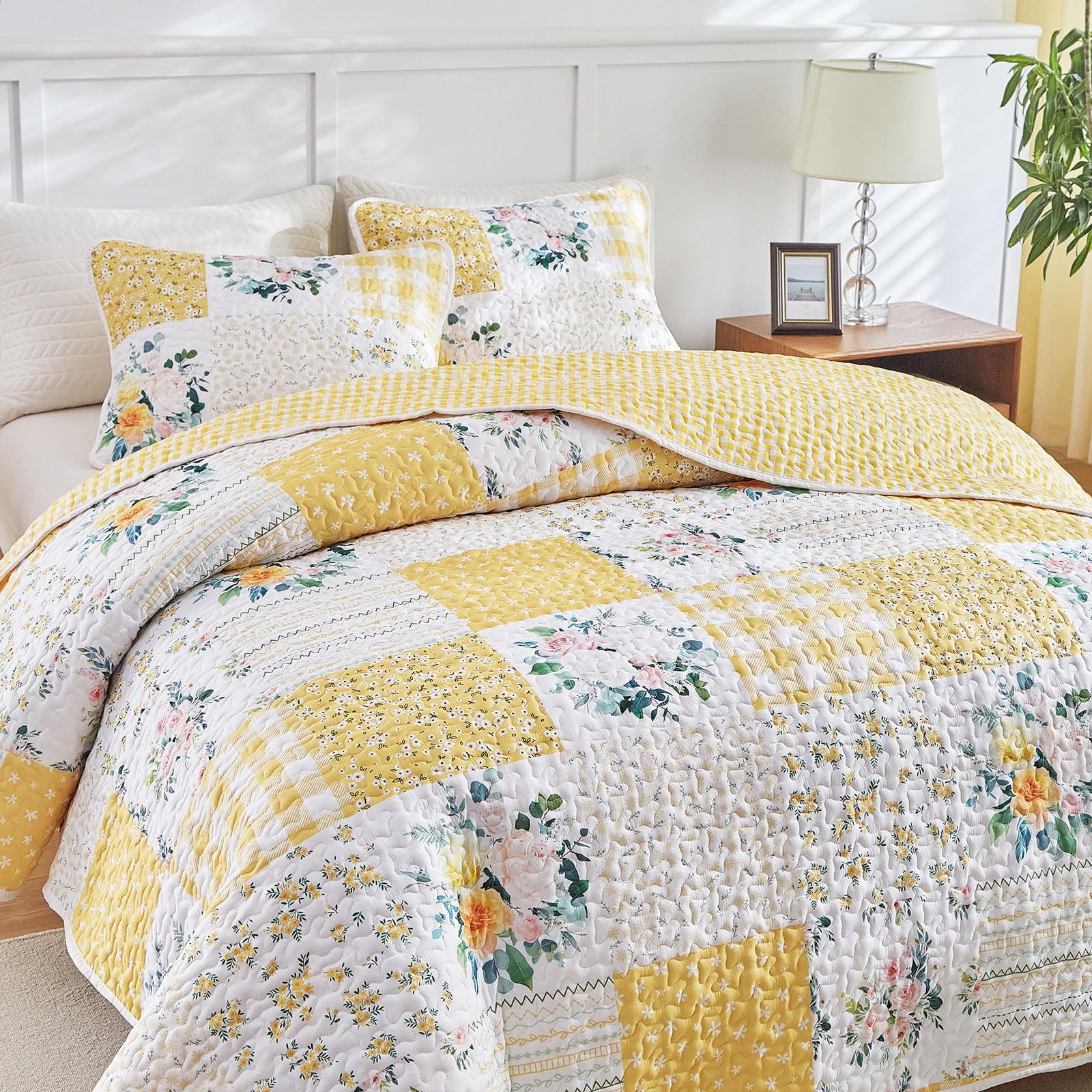 Joyreap reversible quilt reveals floral front and grid back