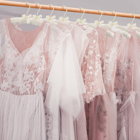 JS HANGER satin-covered hanger reduces snags and protects delicate fabrics.