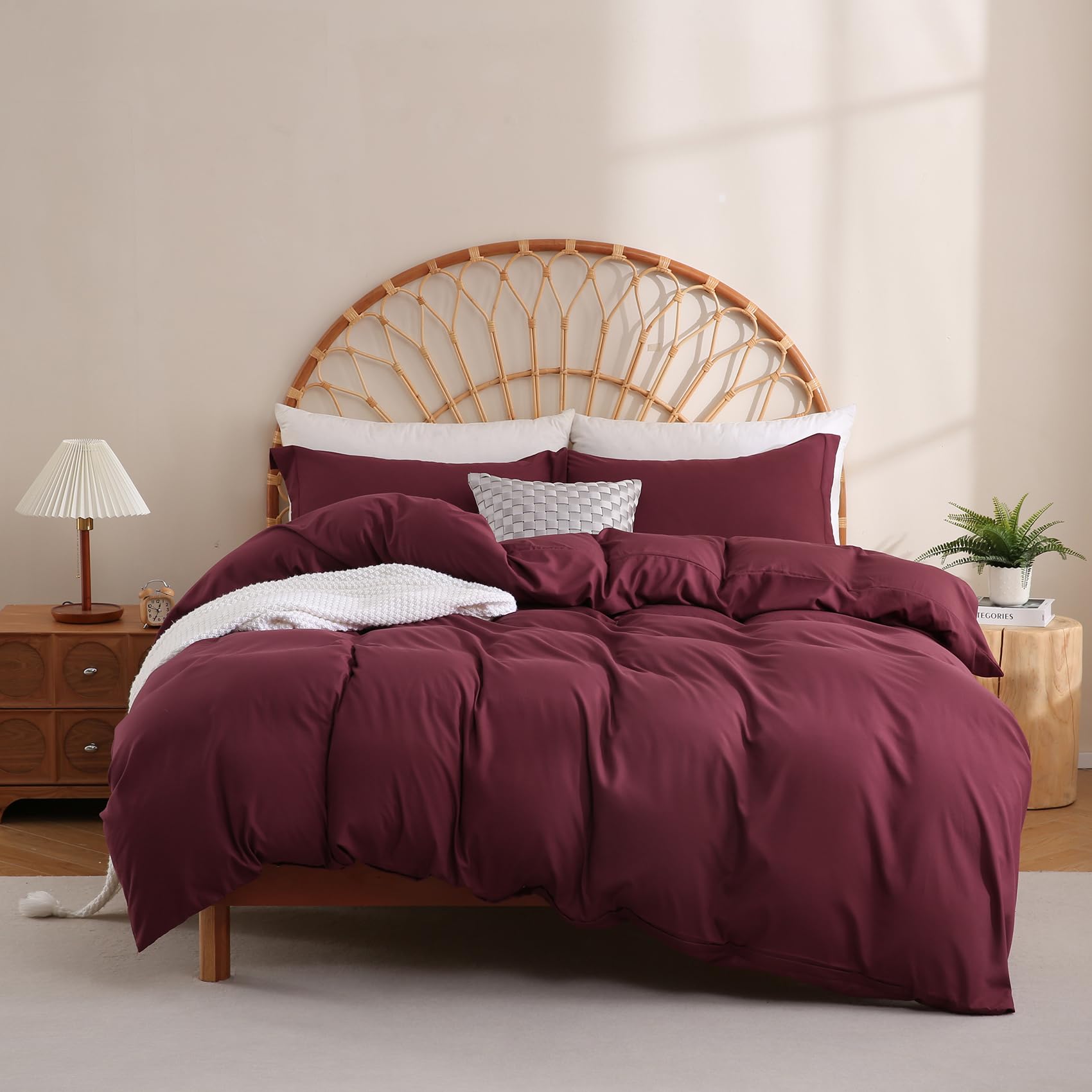 JSD Burgundy duvet cover set on bed showing rich color and smooth microfiber texture