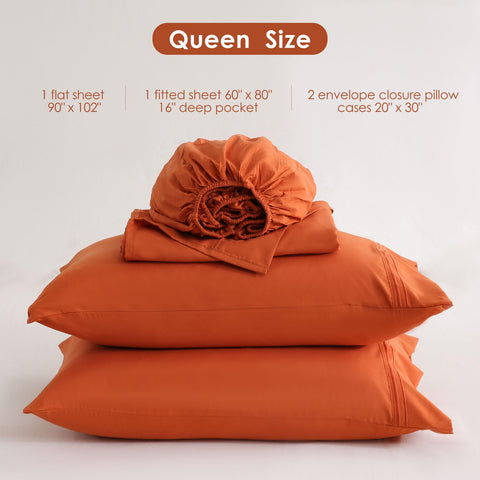 JSD Burnt Orange Queen Sheet Set on bed with rich color and smooth drape