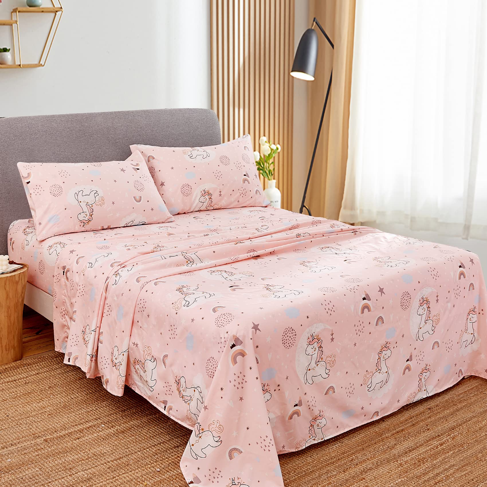 JSD Pink Unicorn sheet set fitted on bed showcasing deep pocket fit