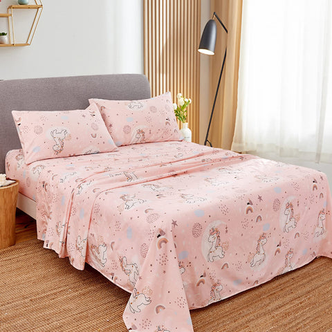 JSD Pink Unicorn sheet set fitted on bed showcasing deep pocket fit
