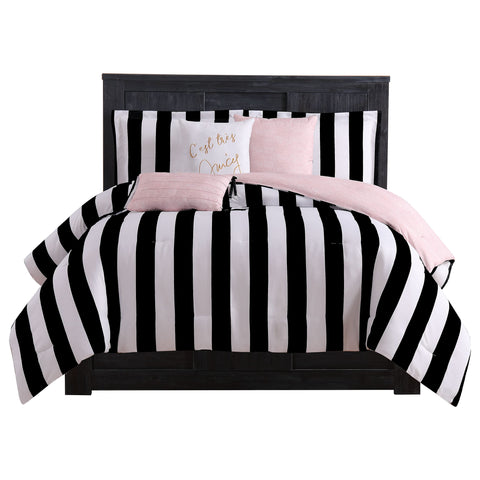 Juicy Couture Cabana Stripe reversible comforter creates a bold bedroom focal point.