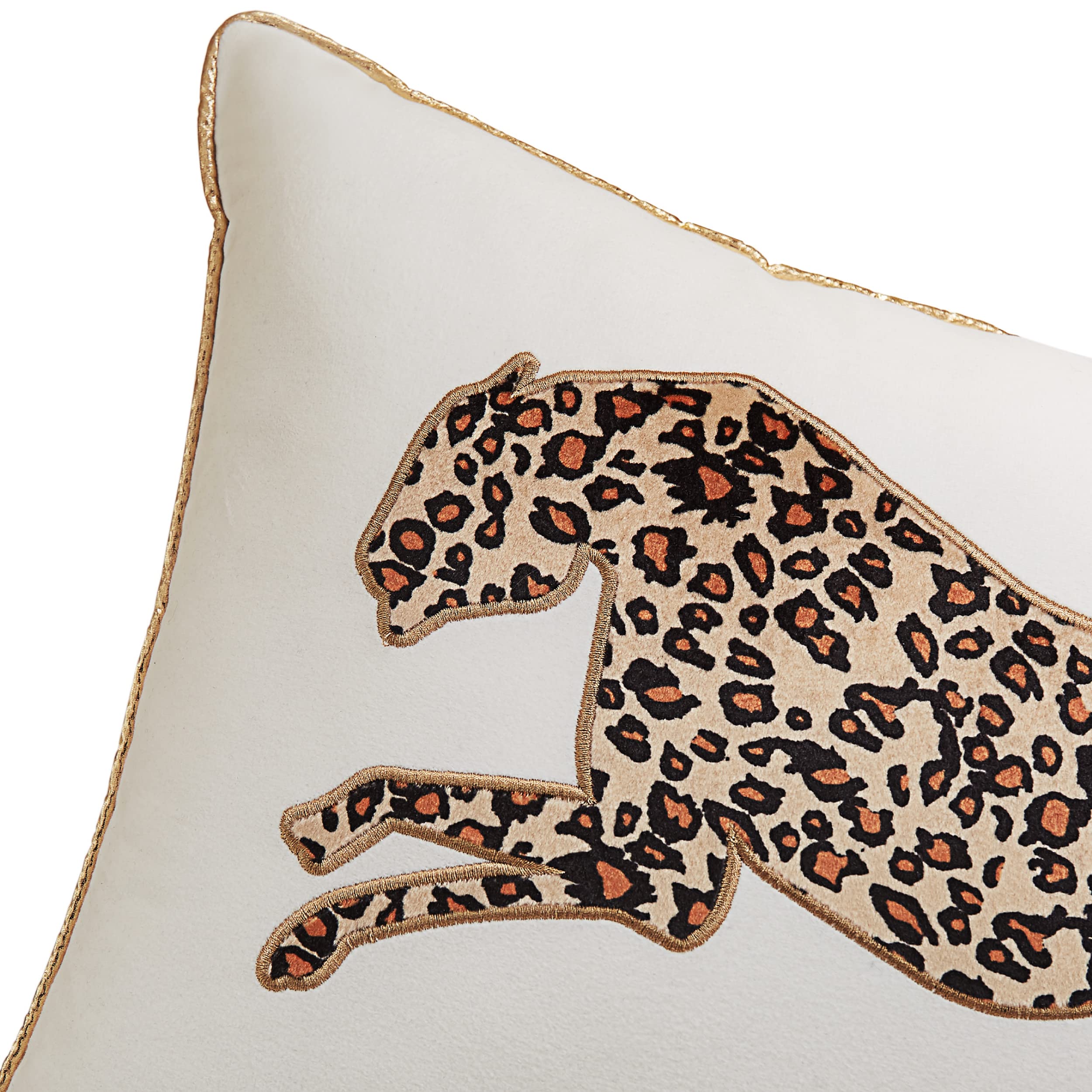 Juicy Couture pillow on sofa display for instant glam