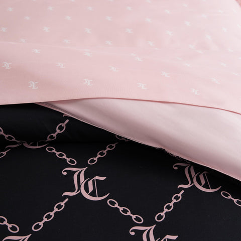 Juicy Couture pink logo sheet set delivers luxurious texture for everyday sleep.