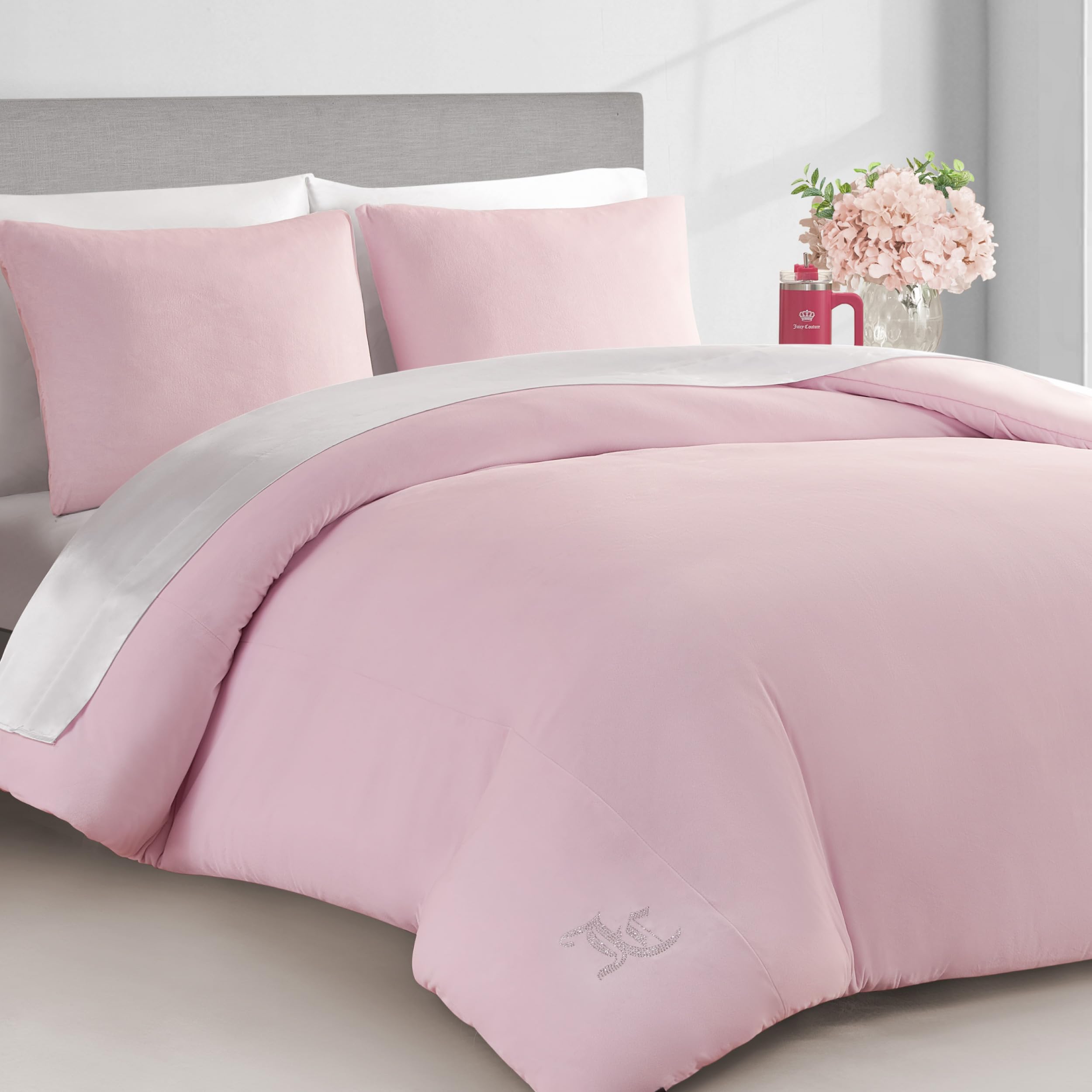 Elegant Juicy Couture bedroom setup featuring marshmallow pink bedding for chic decor