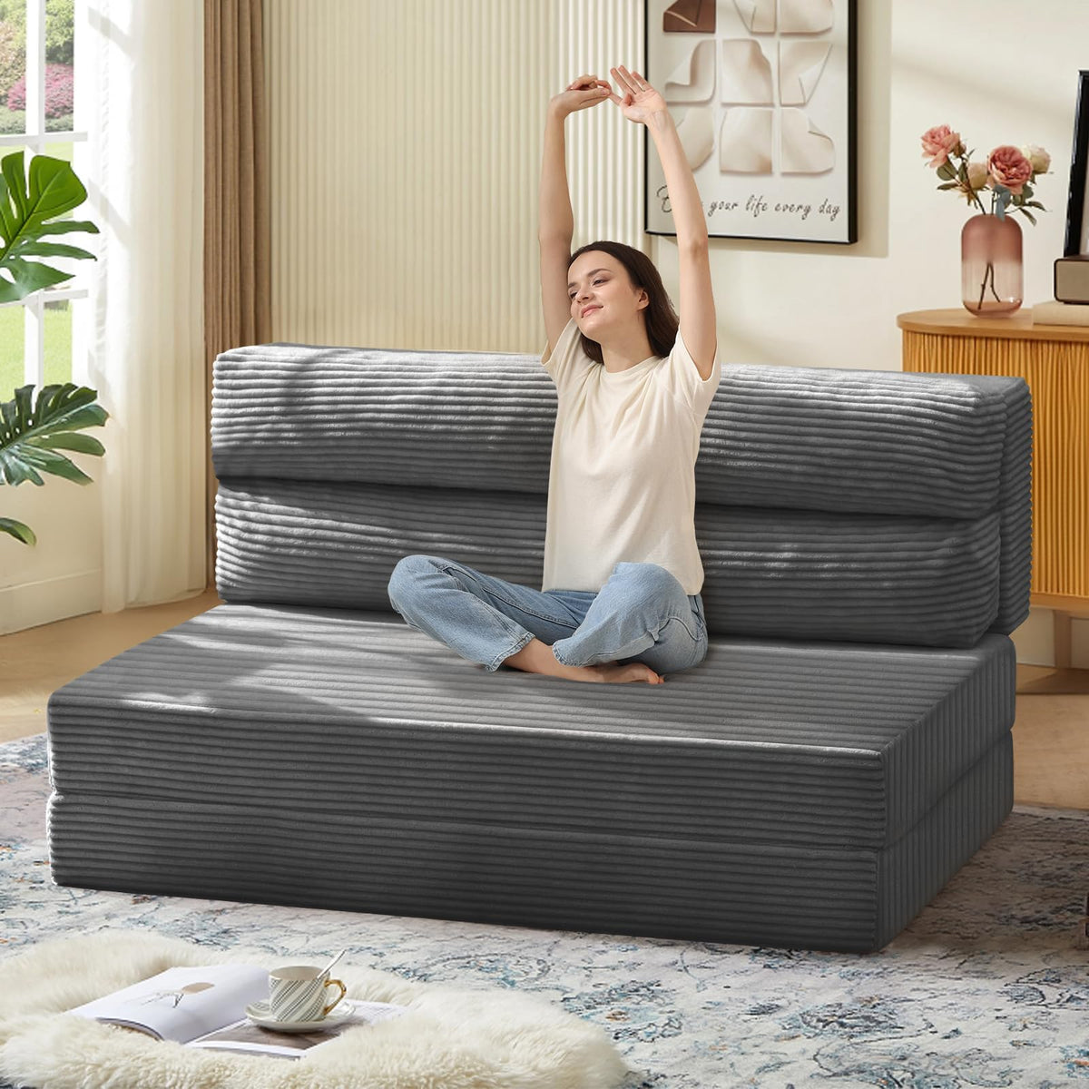 JUIKURY folding sofa bed folded for compact storage in living space