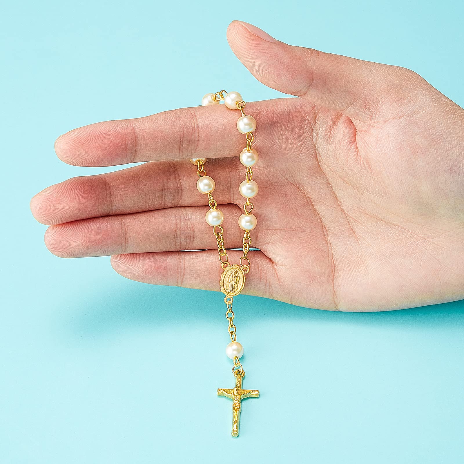Junkin rosary with a gold-plated crucifix at the bottom, elevating ceremony mood