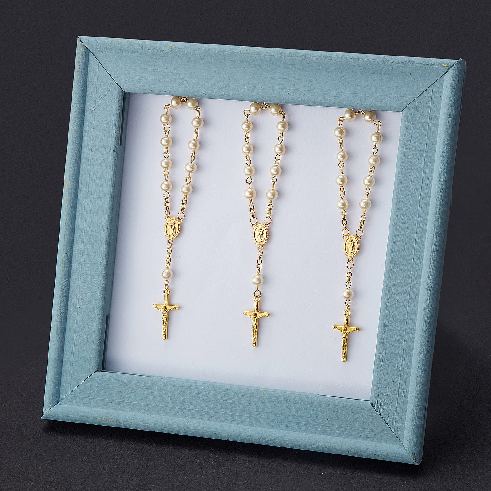Junkin organza gift bags paired with rosaries for elegant presentation