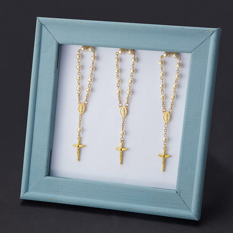 Junkin organza gift bags paired with rosaries for elegant presentation