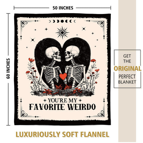 Juratar blanket folded on bed demonstrates versatile home comfort.
