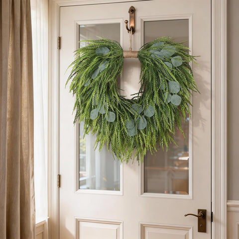 Juxdp wreath displayed in a window for natural lighting appeal