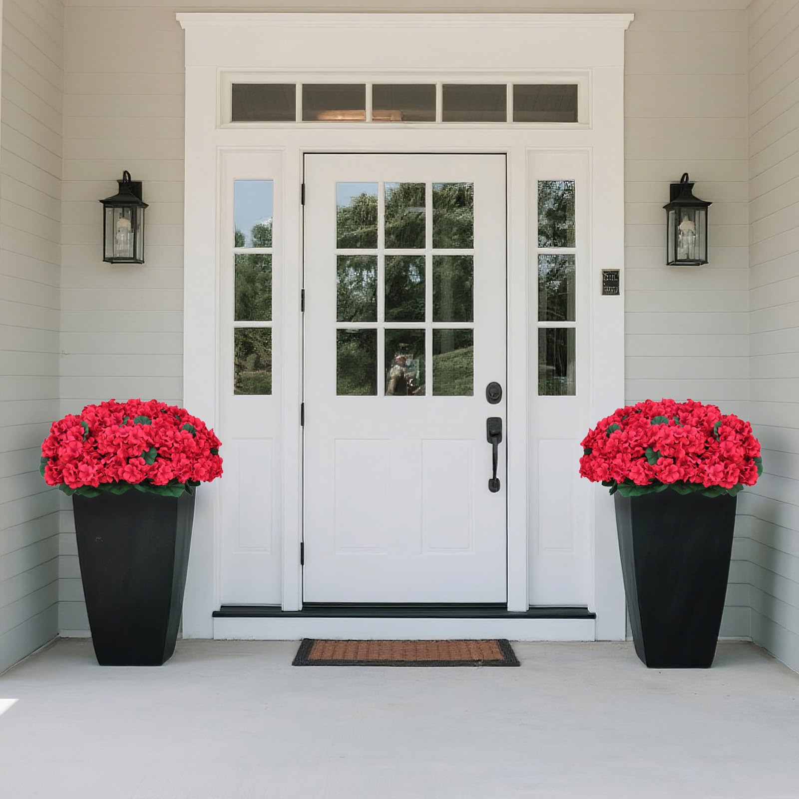 Juxdp cement-weighted pots keep the topiaries stable outdoors.