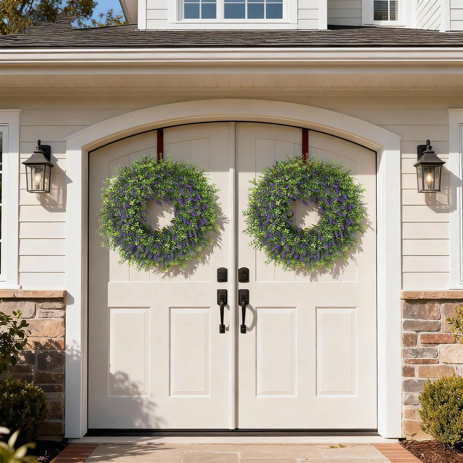 Juxdp front-door wreath close-up shows plump lavender blooms and lush boxwood