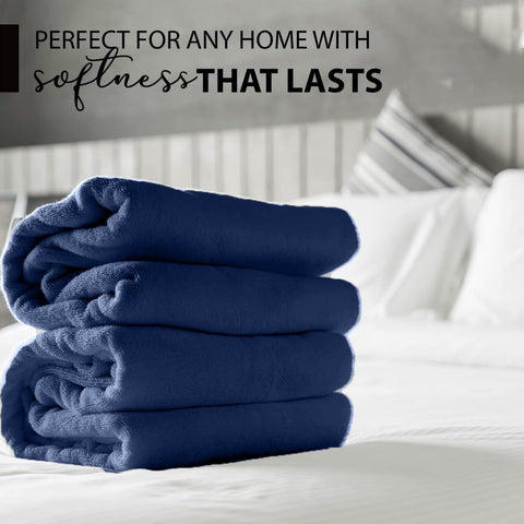 KAHAF COLLECTION navy towel draped over rod highlights luxury feel and quick moisture pickup.