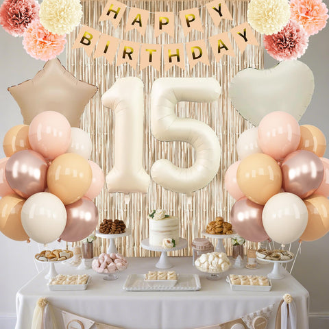 KAINSY dusty pink paper pompoms add soft texture to decor.