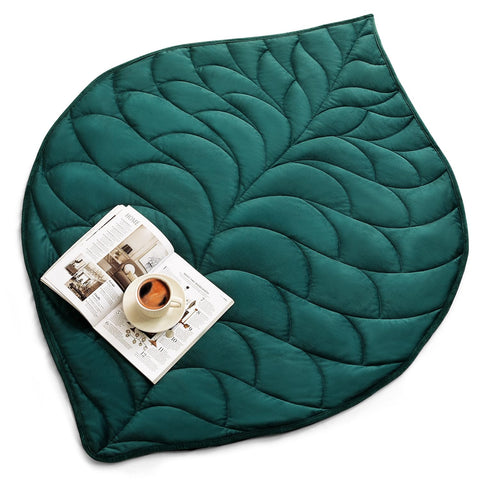 Kaisa weighted lap blanket in green with 41x53 inches for comforting warmth.