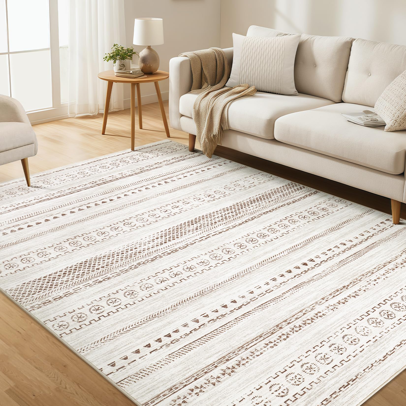 Kakania 5x7 washable area rug in brown demonstrates easy-care versatility for living spaces.