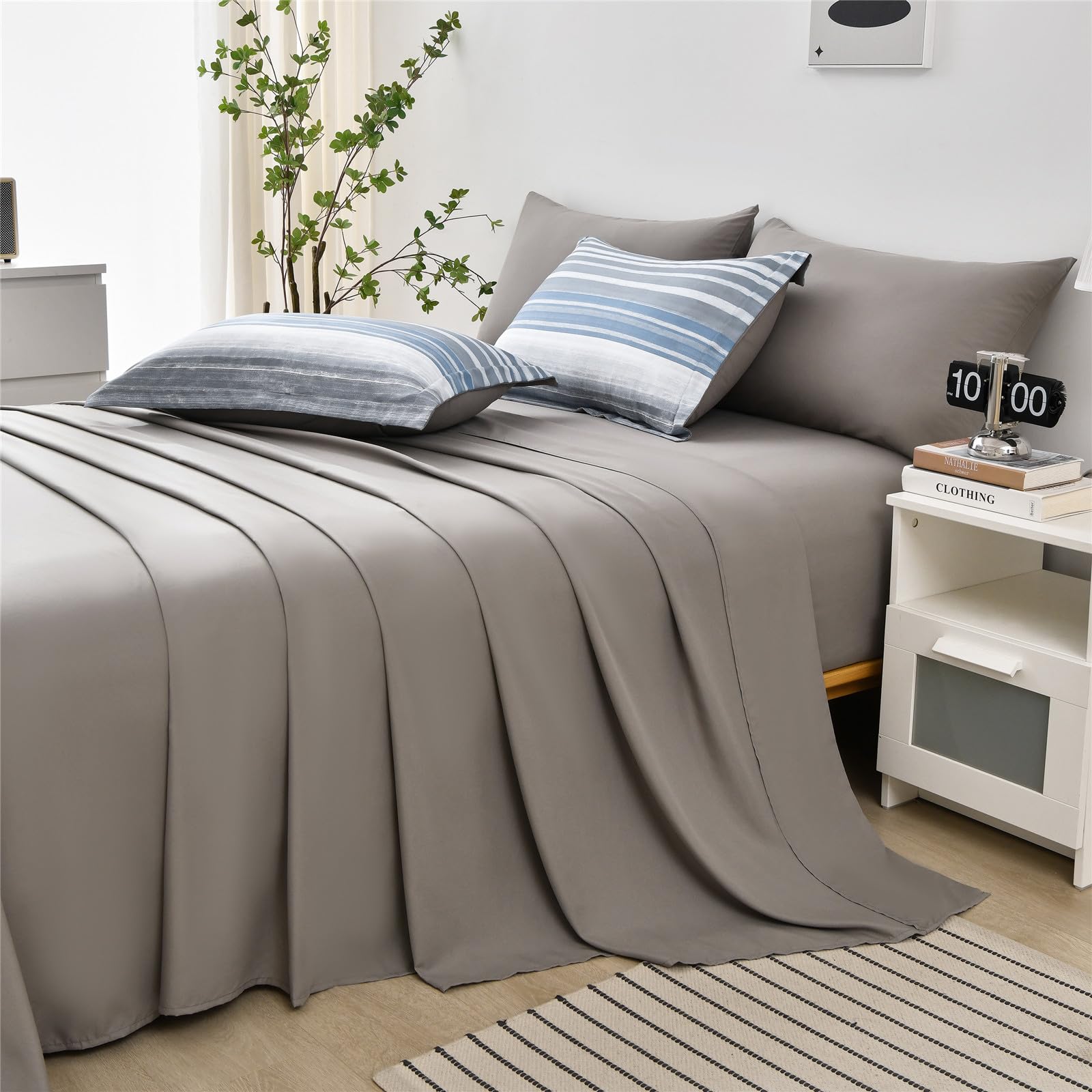 KAKIJUMN blue, white and grey stripes present a modern calming palette for any room.