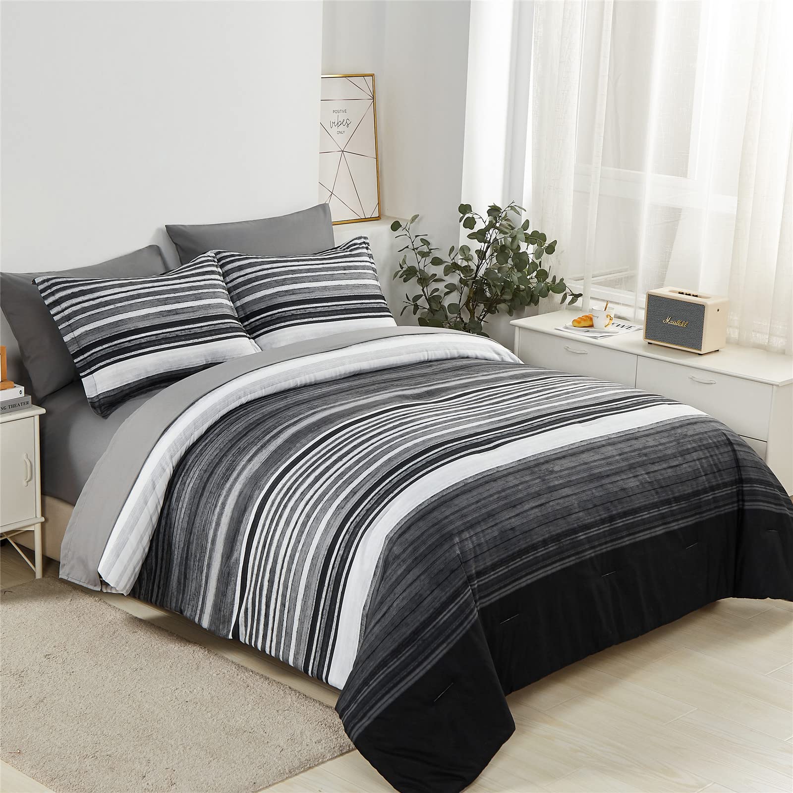 KAKIJUMN stripe queen comforter for a modern white-gray-black bedroom.