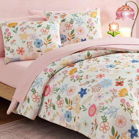 Kaleido Space fitted sheet in pastel garden keeps mattress snug and tidy