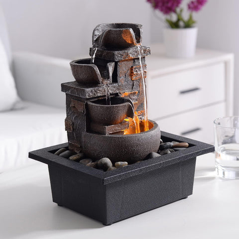 Kalona desktop fountain mimicking castle-rock look adds natural decor to any space.