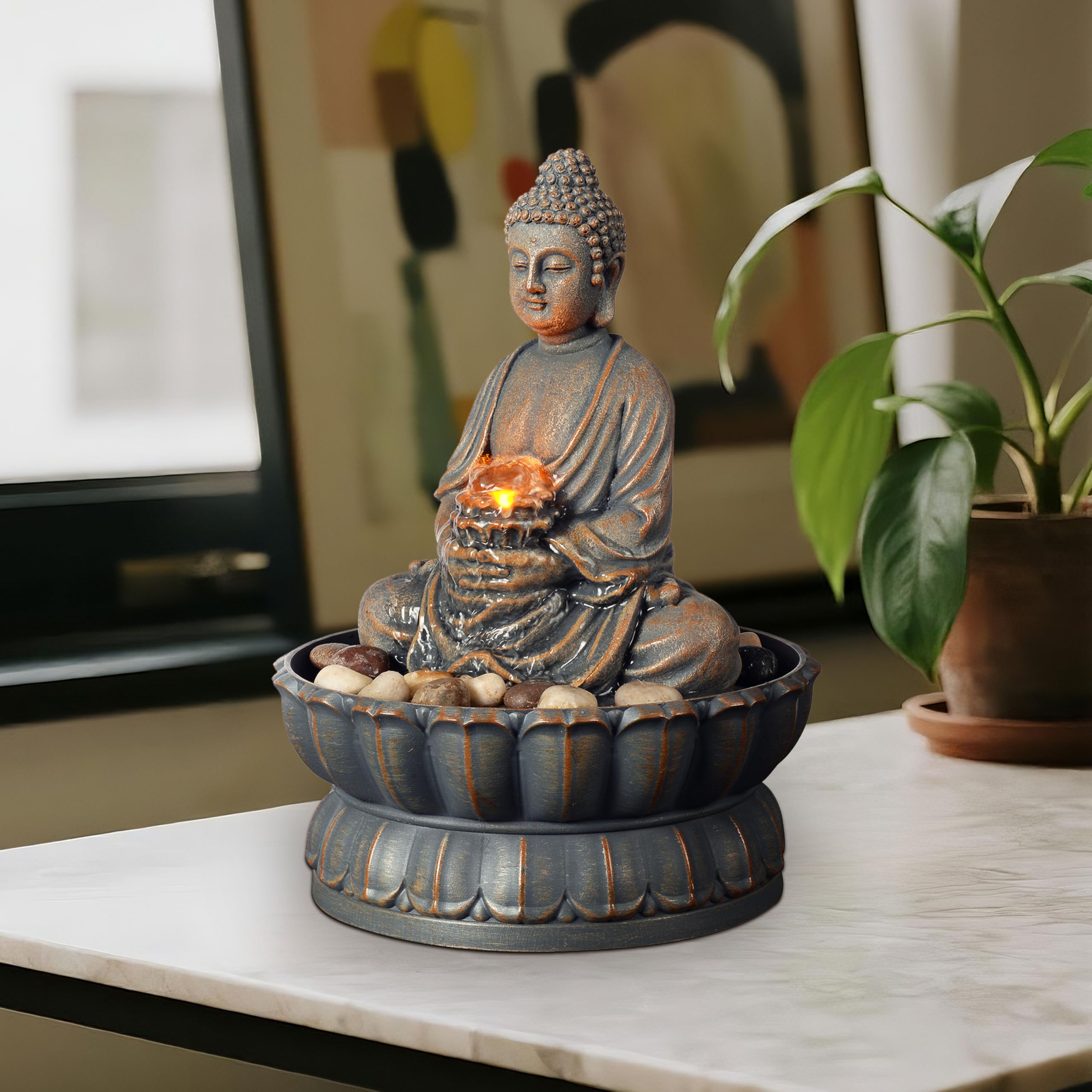 Kalona fountain with reflective lighting creates warm ambiance on your shelf.