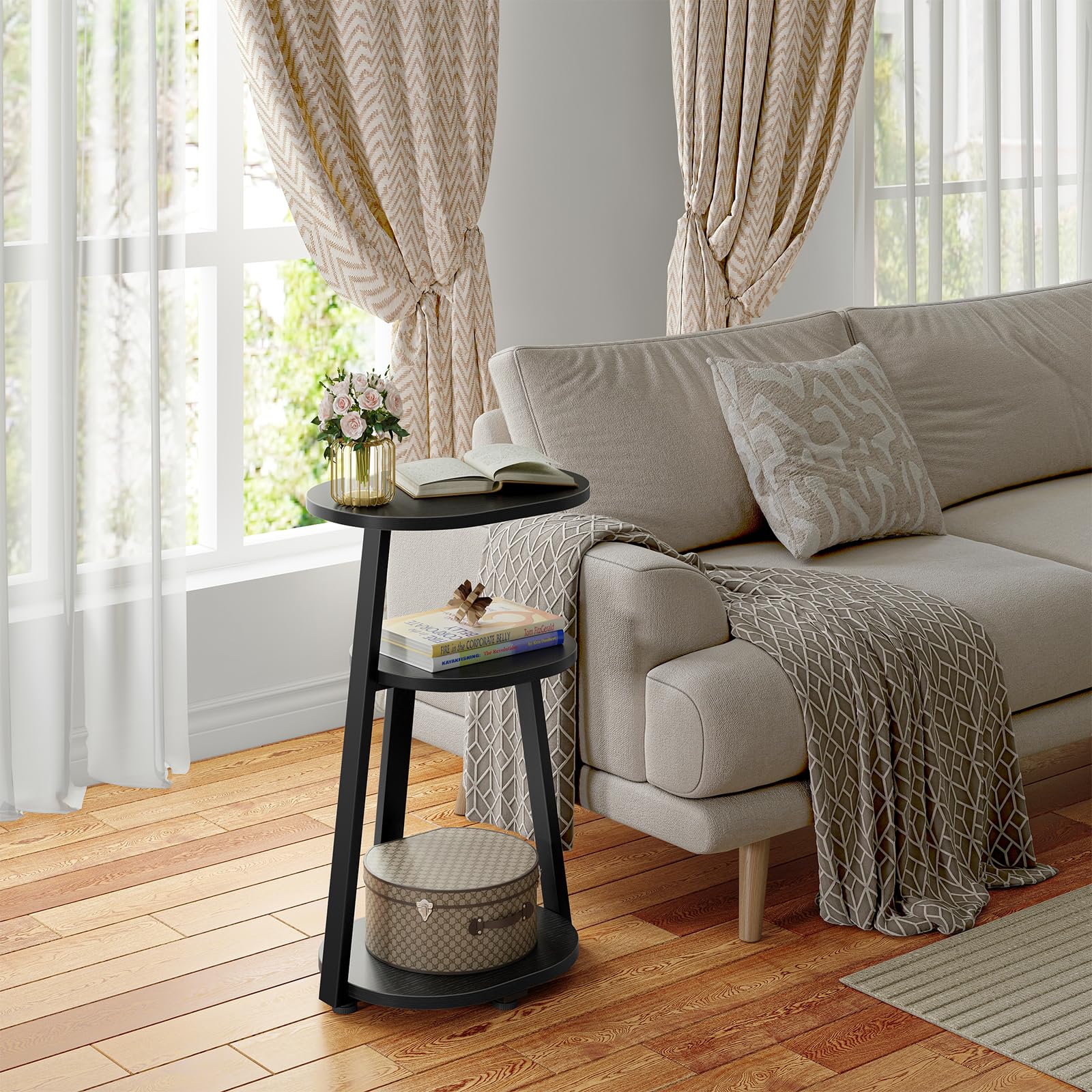 Kalrin three-tier end table with open storage for organization.