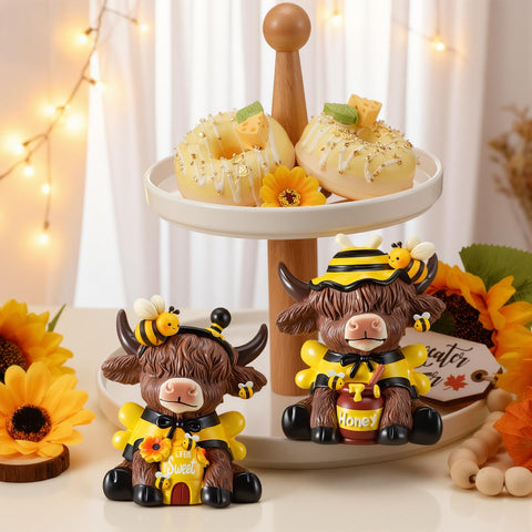 Karenhi pair of bee Highland cow statues ideal as gifts.