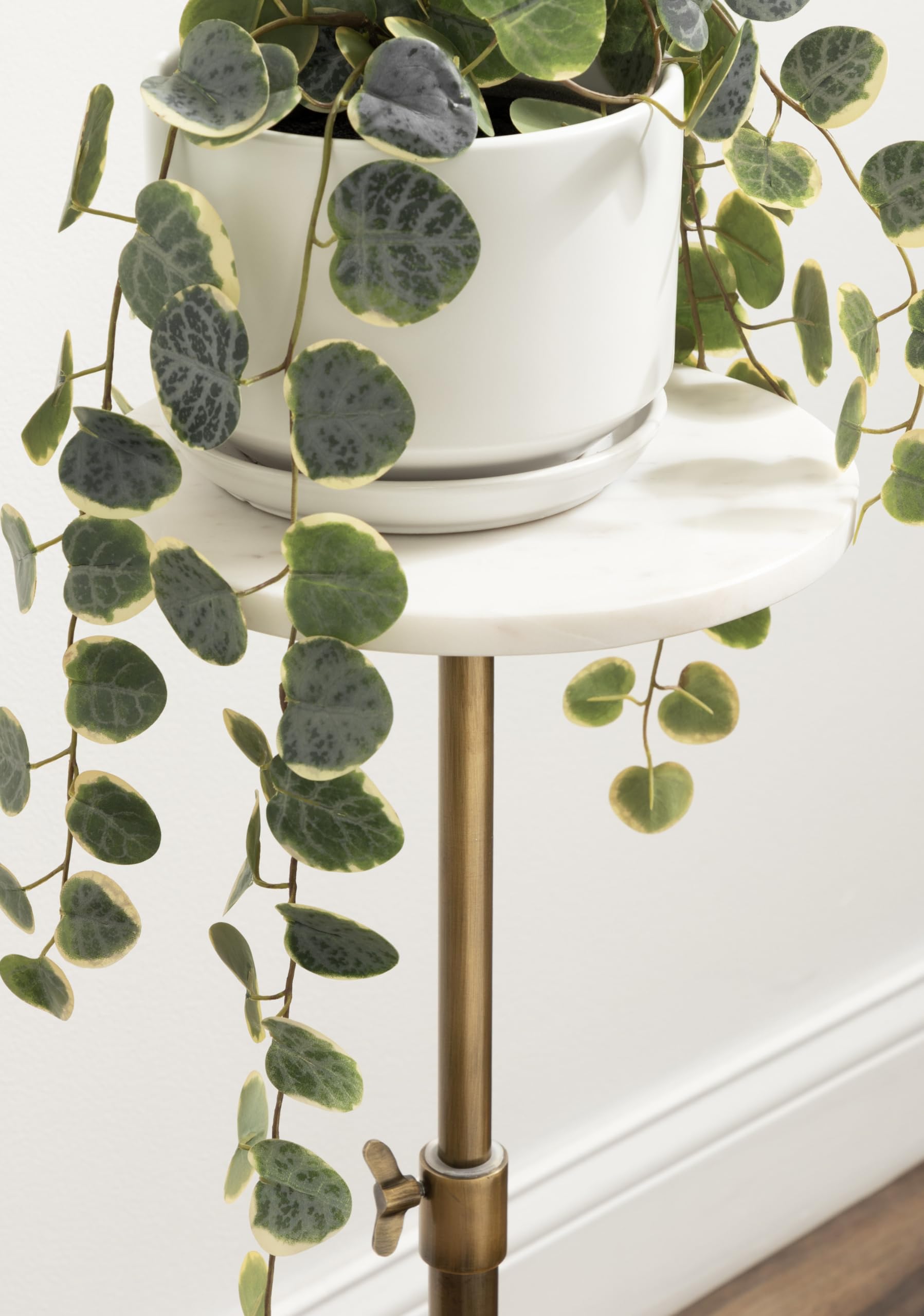 Kate and Laurel Engles compact end-table fits small rooms for versatile decor.