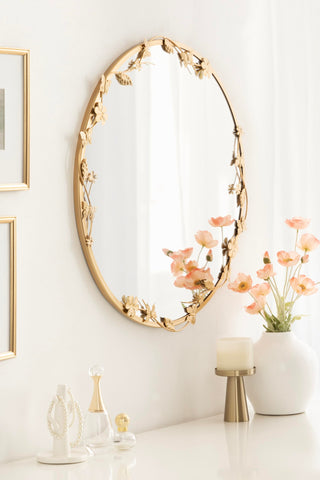Kate and Laurel Rosella 26-inch diameter circle mirror anchors living spaces.