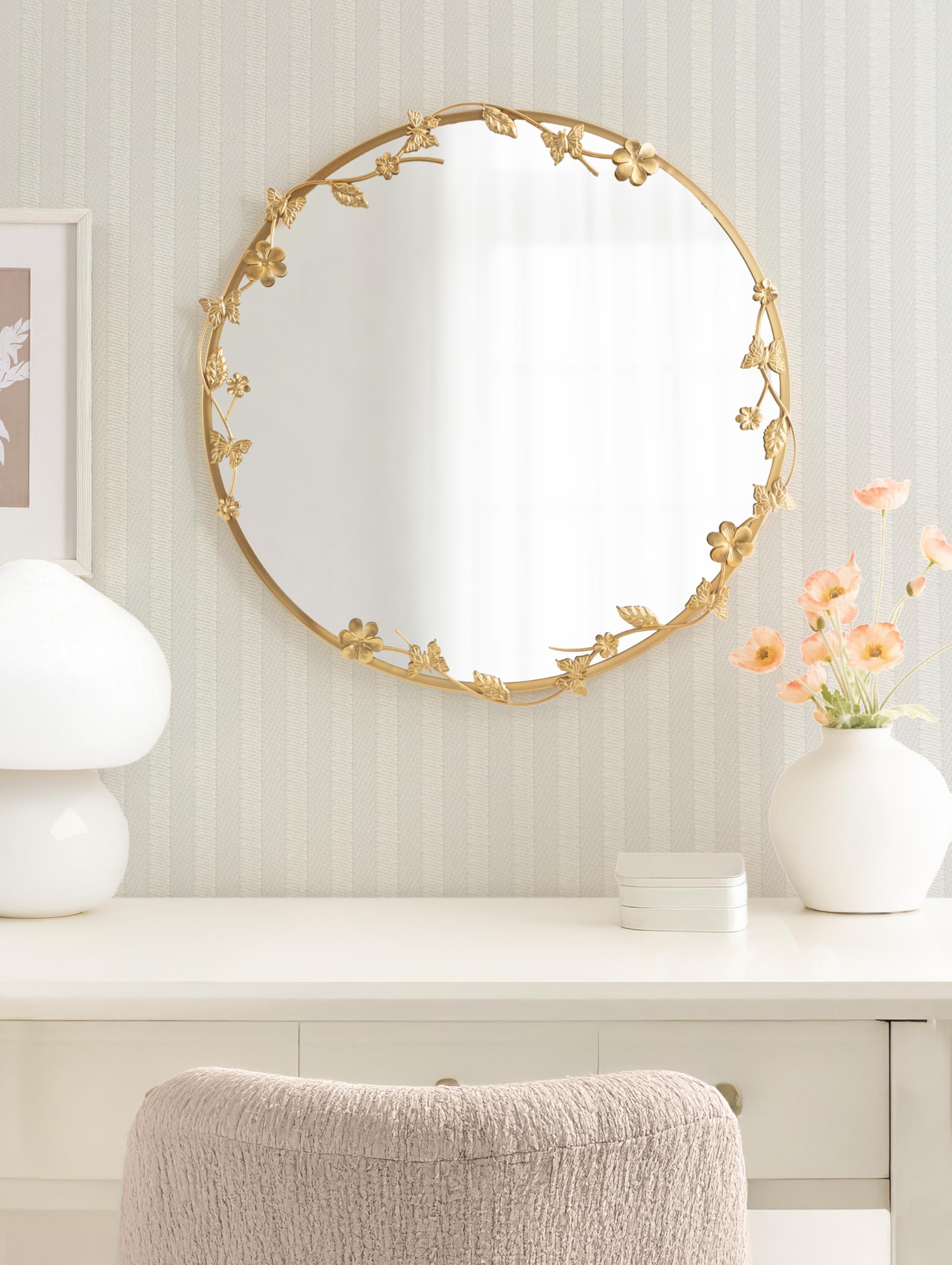 Kate and Laurel Rosella mirror over sink creates glamorous bathroom focal point.