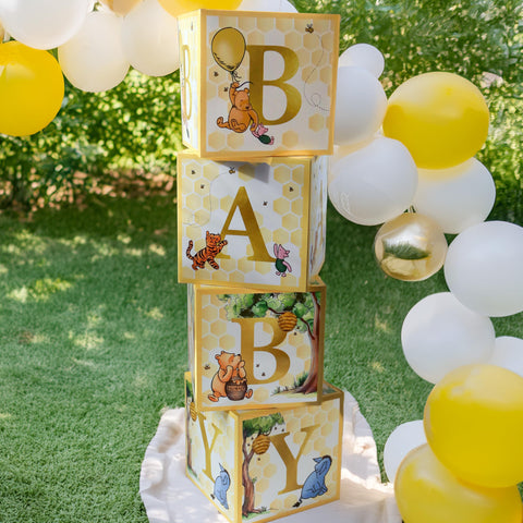 Kate Aspen A Little Honey Is On The Way Winnie baby boxes display B-A-B-Y in gold for decor