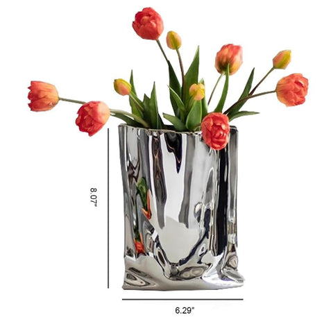 Katoonx 8-inch vase holds flowers or branches for versatile décor.