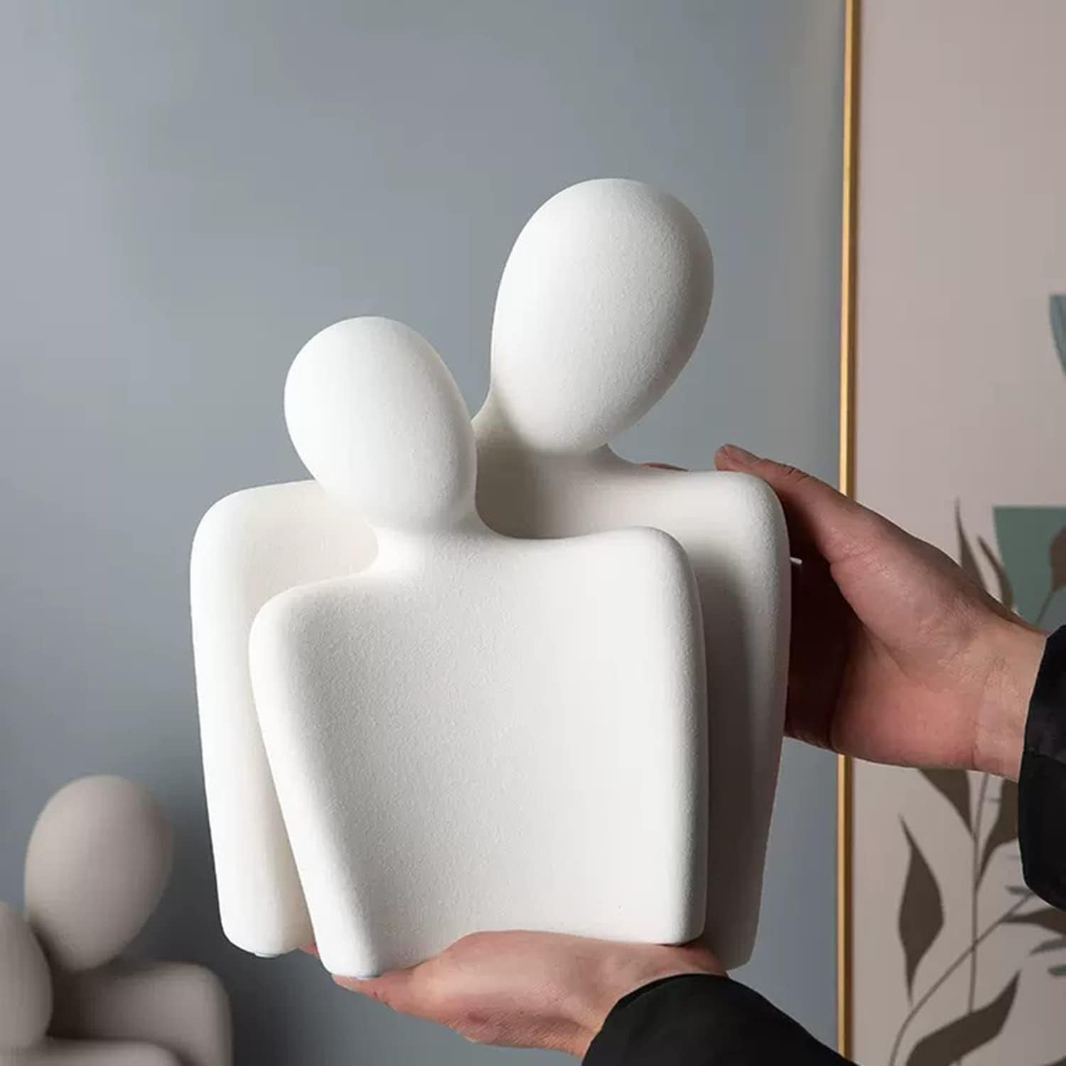 Katoonx ceramic lover figurine closeup highlights delicate detailing for a refined home accent.
