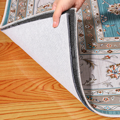 Kautudrum rug pad in living room setup for wrinkle-free placement