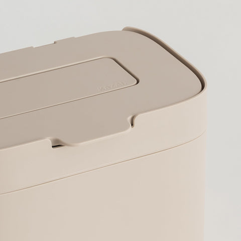 Taupe finish of Kazai Elin compost bin blends with decor