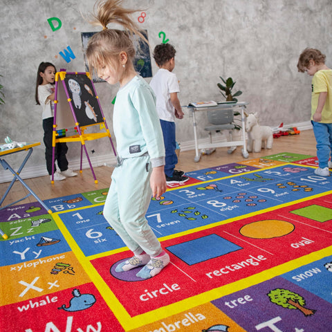 KC Cubs Colorful Patterns Rug invites imaginative play and early math discovery.