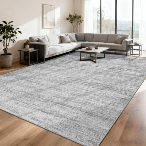 Kearoat 8x10 abstract area rug with modern lines in a living room.