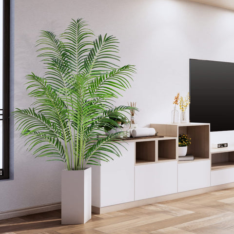Keeplush artificial palm tree in living room setting.