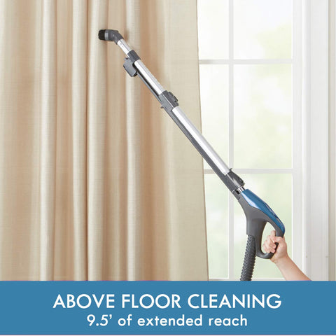Kenmore BC3005 extended-wand assembly demonstrates reach for high shelves and under furniture.