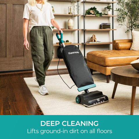 LED headlight on Kenmore BU1001 B200 highlighting dark corners for thorough cleaning.