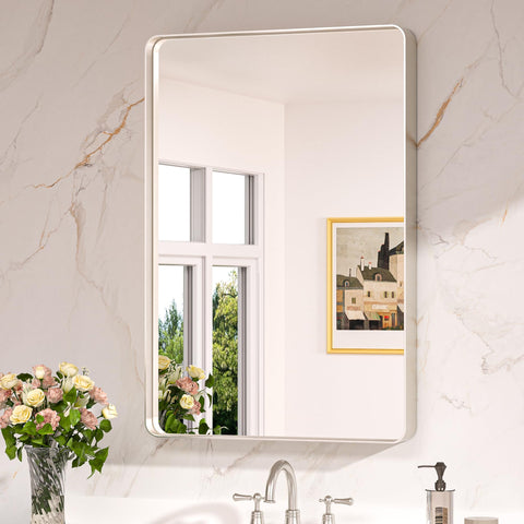 Keonjinn brushed-nickel mirror 24x36 for over-sink elegance and moisture resistance.