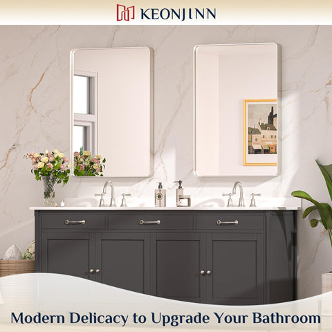 Keonjinn rounded metal frame mirror emphasizes modern style in any bathroom.