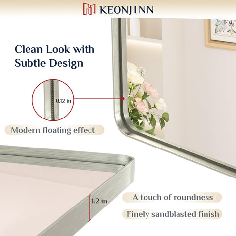 Keonjinn rounded rectangle mirror in matte white complements clean contemporary bathrooms