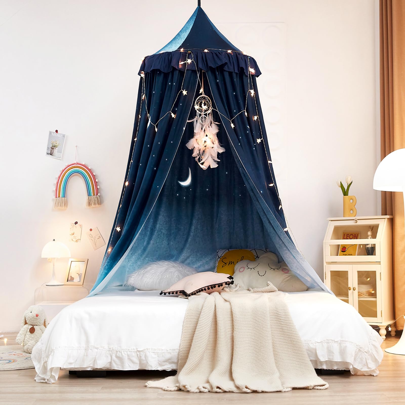 Kertnic Decor Canopy reading nook under the canopy for cozy story time.