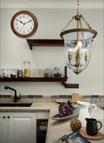 Kesin wooden wall clock with glass cover protecting the dial from dust.