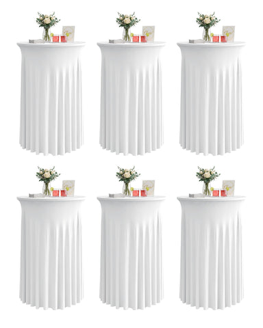 KeyWave cocktail table skirt draped over white highboy for elegant weddings.