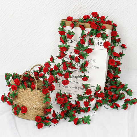 KHOYIME bendable rose garland drapes over stairs and rails.