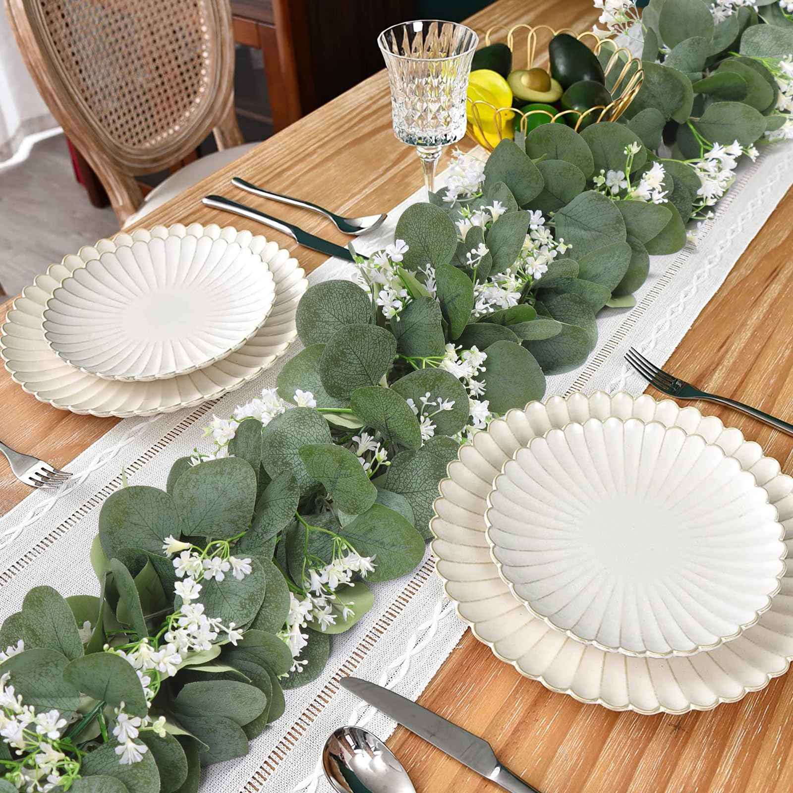 Khoyime garland crafted in soft silk for lifelike greenery and easy styling.